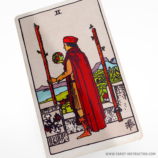 Two of Wands tarot card meaning, Fire element in tarot, Suit of Wands tarot cards